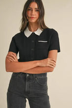 Black contrast collared knit cropped polo with mable button and chest pocket