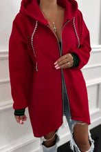 Red contrast cuffed drop shoulder zip up hoodie with striped drawstrings and ribbed cuffs made of slightly stretchy fabric with machine wash cold care instructions