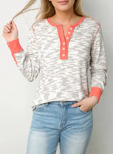 Women’s contrast long sleeve henley top with coral stripes