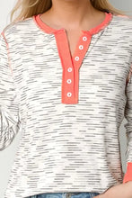 Women’s contrast long sleeve henley top with coral placket and white stripes