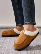 Pair of tan suede-like contrast round toe flat slippers with white faux fur lining