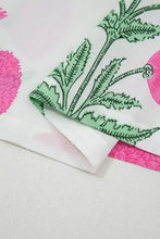 White fabric contrast scallop trim layered short sleeve v neck blouse with vibrant pink and mint green botanical print