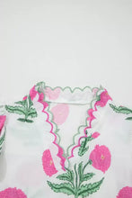 White cotton contrast scallop trim layered short sleeve v neck blouse with vibrant pink poppy flowers and green stems