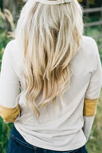 Woman in contrast stitching color block long sleeve T-shirt