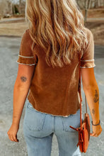 Brown waffle-knit t-shirt with contrast stitching round neck and ruffled cuffs