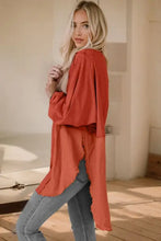 Coral drapey long sleeve blouse with contrast texture round neck and side slits