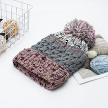 Grey and purple contrast thermal hat with pom-pom detail