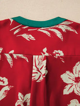 Red shirred puff sleeve blouse with white floral print and contrast tied neck collar in teal color