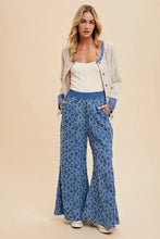 Blue and white patterned wide-leg pants with relaxed fit cardigan