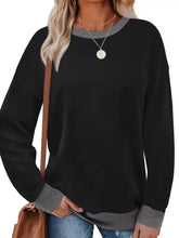 Black casual sweatshirt with contrast trim gray ribbed cuffs and neckline made of slightly stretchy fabric