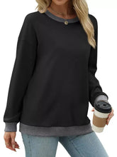 Black casual sweatshirt with contrast trim and gray ribbed neckline cuffs hem made of slightly stretchy fabric