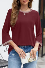 Contrast trim round neck three-quarter sleeve maroon t-shirt with jeans