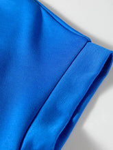 Contrast trim short sleeve top in vibrant royal blue satin with smooth glossy finish and neat stitching, ideal for pom trim styles