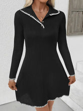 Black ribbed knit sweater dress with white scalloped trim