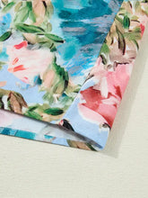 Contrast trim v neck cuffed bracelet sleeve floral blouse in soft watercolor floral print fabric with pink green and blue tones