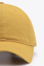 Classic baseball cap in mustard yellow with visible stitching