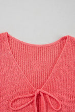 Coral knit crop top with tie v neck and slightly stretchy material