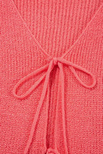 Coral pink knit crop top with tie v neck and slightly stretchy material