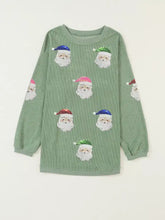 Festive olive green corduroy long-sleeve sweatshirt with sequined santa claus faces, machine wash cold recommended