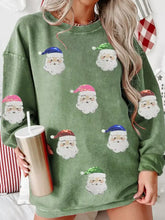 Olive green corduroy sweatshirt with corded ribbed texture and sequined santa claus appliqués machine wash cold