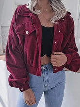 Burgundy corduroy cropped jacket with hood, buttons, pockets, and product measurements