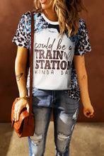 Short-sleeved leopard print t-shirt with train station kinda day text