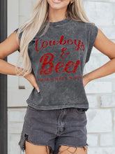 Faded gray sleeveless mineral wash tank top with red cursive cowboys and beer graphic for western wear