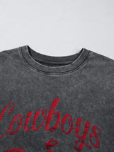 Dark gray distressed cotton mineral wash tank top with bold red cowboys script graphic on the chest