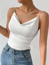 White satin cowl neck cami top with thin spaghetti straps and draped neckline for elegant layering or casual wear