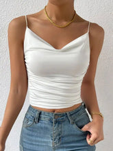 White satin cowl neck cami top with thin spaghetti straps and draped neckline for elegant layering