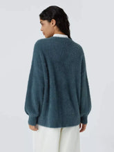 Cozy knit button-down cardigan in soft teal fuzzy knit, machine wash