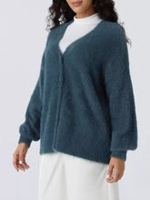 Cozy knit button-down cardigan in teal fuzzy plush texture, machine wash