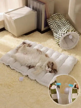 Cozy plush pet tunnel nest with white quilted rectangular bed