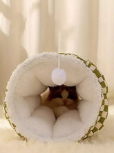 Cozy plush pet tunnel nest with soft white interior and checkered trim