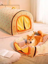 Cozy polka dot pet bed cave with cream exterior, pink polka dots and yellow lining