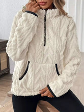 Cream-colored cozy sherpa half zip sweatshirt with textured knit fleece, black zipper, and relaxed fit trim