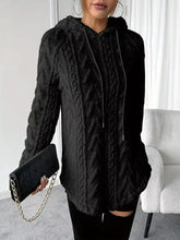 Black cable-knit hooded sweater with plush fleece fabric, drawstring detailing, slightly stretchy, and machine wash care instructions