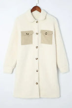 Cream and beige faux fur teddy coat with high collar and patch pockets