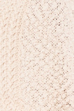 Cream boucle cropped cardigan with bell sleeve length and textured knit