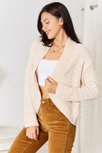 Cream boucle cropped cardigan with bell sleeve length and relaxed fit