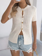 Cream cable knit button short sleeve cardigan with gold buttons and lace detailing