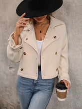 Cream double-breasted jacket with collared neck long sleeve and gold buttons