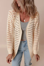 Cream openwork open front knit cardigan with polka dots and slightly stretchy fabric