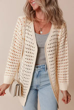 Cream knit cardigan with openwork open front and slightly stretchy fabric