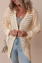 Cream knit cardigan with openwork open front and slightly stretchy fabric