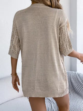 Cream openwork half sleeve cardigan with lace detailing on sleeves and hem