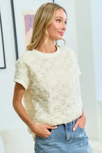 Cream short-sleeve top with 3D mesh flower fabric and drop shoulder