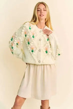 Cream floral embroidered cardigan with Dani floral pattern, pearl embellishments and button closure