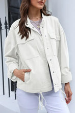 Cream utility jacket with adjustable drawstring and long sleeve length