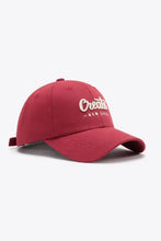 Red CREATE NEW LIFE cotton baseball cap with embroidered front